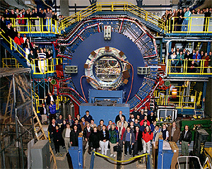 The PHENIX detector at Brookhaven National Laboratory's Relativistic Heavy Ion Collider (RHIC) records many different particles emerging from RHIC collisions, including photons, electrons, muons, and quark-containing particles called hadrons.