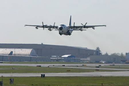 The NSF/NCAR C-130 research aircraft taking off for a research flight as part of the MILAGRO / INTEX campaign in Spring 2006. Photo credit: Edward Dunlea.