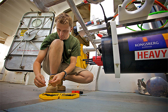 J Murray Roberts prepares a microlander to be deployed amongst cold-water corals off the coast of Florida. Image courtesy of Art Howard.