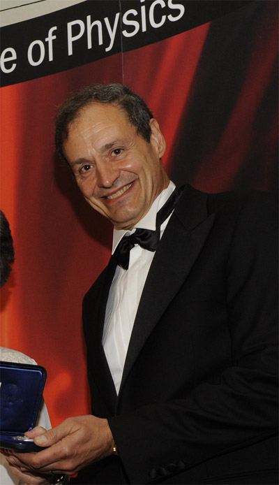 Ignazio Ciufolini receiving the Occhialini medal and prize 2010 by the Institute of Physics (IOP) in London “For providing further experimental confirmation of Einstein’s theory of General Relativity through the use of laser-ranged satellites to study and measure frame-dragging”. This prize was mainly based on the 2004 Nature paper.