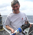 Dr. George Luther holds the E-chem sensor that will measure vent chemicals on the seafloor.
