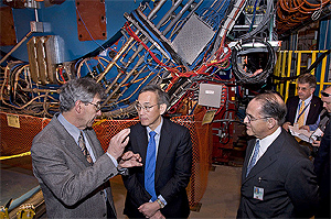 Energy Secretary Steven Chu (center) tours the STAR detector at Brookhaven National Laboratory's Relativistic Heavy Ion Collider (RHIC). Accompanying Secretary Chu are Associate Laboratory Director for Nuclear and Particle Physics Steven Vigdor (left) and Laboratory Director Sam Aronson.