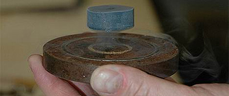 A bulk single grain sample of superconducting Y-Ba-Cu-O being levitated by a permanent magnet. From an interview with David Cardwell featured in the Special Topic of High-Temperature Superconductors (Aug. 2009).