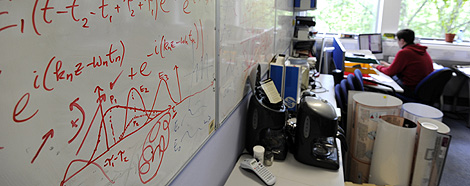 Calculations are seen on a white board in a laboratory at Imperial College in London, May 28, 2010, REUTERS/Paul Hackett